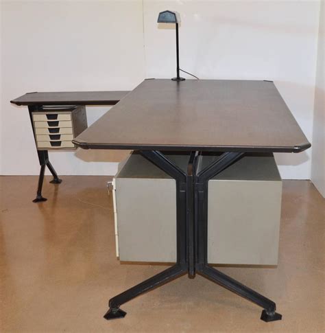 Maybe you would like to learn more about one of these? Olivetti 'Arco' Desk with Return and Lamp at 1stdibs