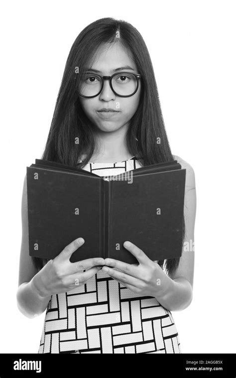 Close Up Of Young Asian Teenage Nerd Girl Holding Book Stock Photo Alamy