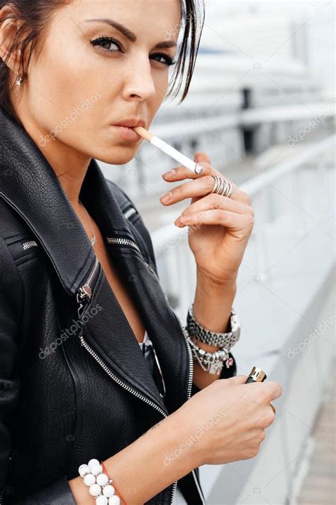 Portrait Of Young Woman Smoking Cigarette — Stock Photo © Johan Jk