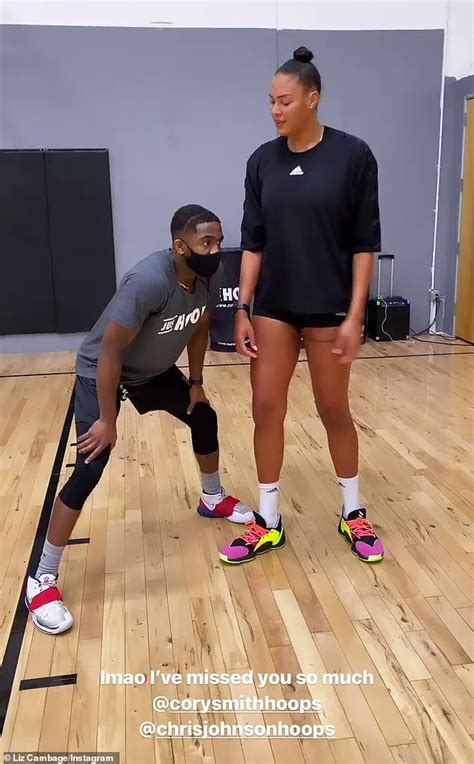 basketball star liz cambage s 6 8 frame towers over her nba trainer 247 news around the world
