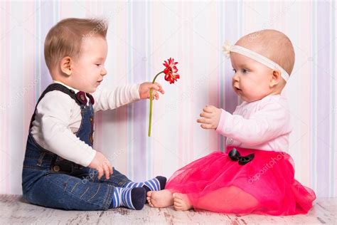 Baby Boy Giving A Flower To The Girl — Stock Photo © Patrykkosmider