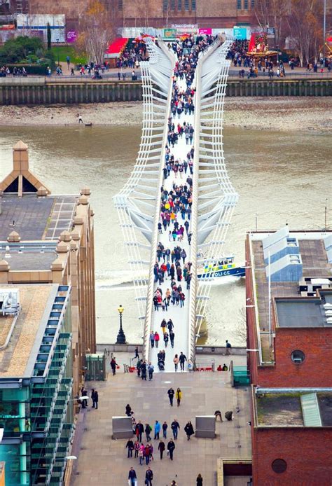 Londonmillennium Foot Bridge Over The River Thames And Office People