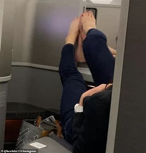 Couple Spotted Playing Footsie Barefoot On American Airlines Flight Daily Mail Online
