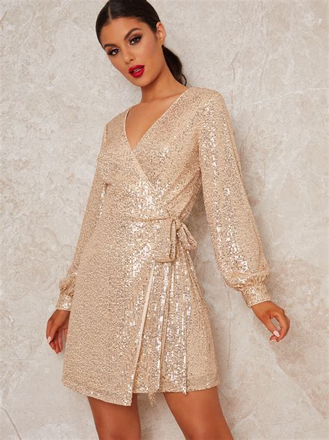Wrap Long Sleeve Sequin Mini Dress In Gold Chichiclothing
