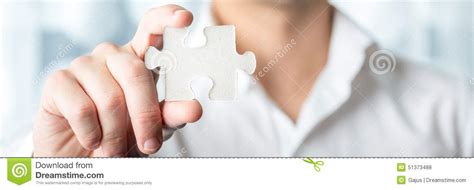 Businessman Holding Jigsaw Puzzle Piece Stock Photo Image Of Concept