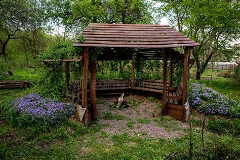 Wooden Arbor Among The Flowers In The Garden Stock Photo Image Of