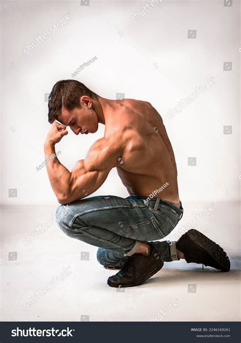 Young Bodybuilder Kneeling Pose Studio Shot Stock Photo 2246169261