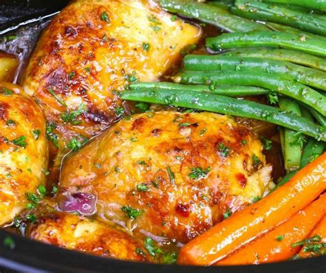 Closeup Of Slow Cooker Chicken Thighs With Carrots And Green Beans With