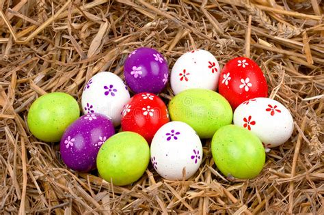 Colorful Painted Easter Eggs Hidden In A Nest Of Straw Stock Image