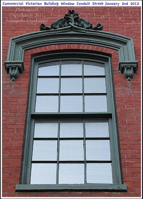 A Victorian Style 2nd Floor Window Of A Commercial