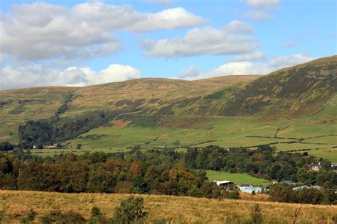 The campsie fells are a range of hills in central scotland, stretching east to west from denny muir to dumgoyne in stirlingshire and overloo. Crow Road over the Campsie Fells. | The Crow Road is seen ...