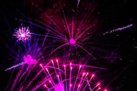 Premium Photo Bright Beautiful Purple Fireworks In The Night Sky