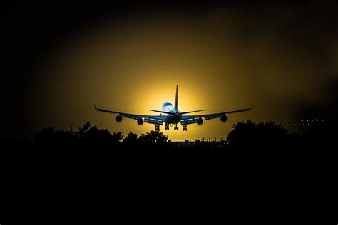 Boeing 747 Sunset Landing Photograph By Andy Choinski