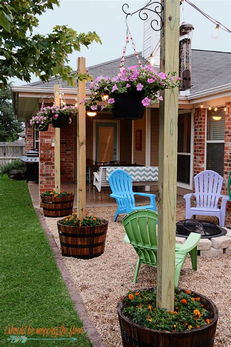 Garden Posts With Hanging Pots And Light Strings Diy Patio Diy