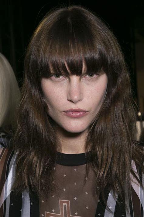 Incorporating some waves makes this one of the best hairstyles for long hair with bangs. Spring 2015 Trendy Hairstyles With Bangs | Fashionisers