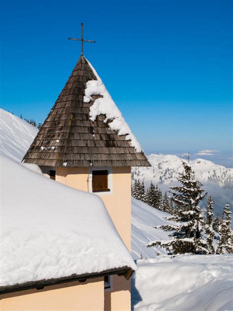 Detailed View Of Rural Mountain Church Tower With Cross On The Top In