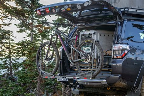 We've talked about how to properly lock your bicycle before, but some bike racks—particularly cheaper comb racks—might require a few tricks. 1up USA Quik Rack Bicycle Rack Review on Toyota 4Runner SUV