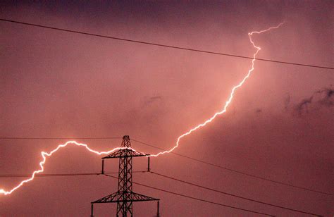 Lightning Hitting An Electricity Pylon By Peter Lawson