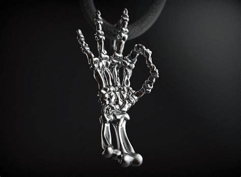 Pendant skeleton hand ok rock 3D printable model | CGTrader