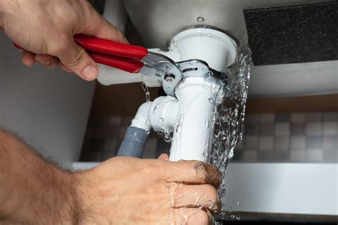 Plumber Fixing Sink Pipe With Adjustable Wrench Stock Photo Download
