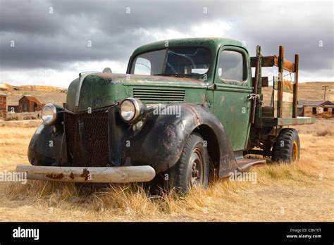 An old Ford truck in a field near a ghost town in Bodie, California
