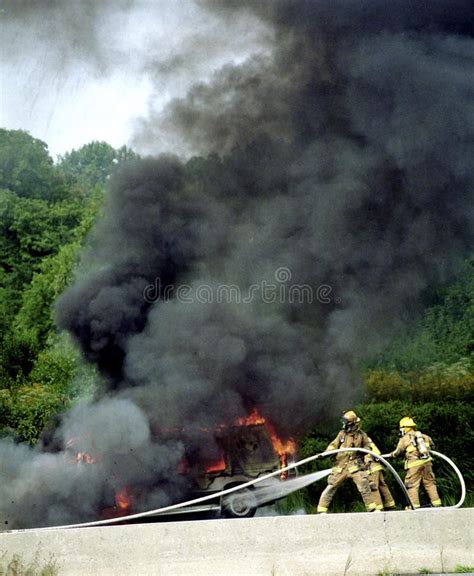 Firefighters Fight A Very Smoky Car Fire Stock Photo Image Of Fire