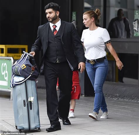 wayne and coleen rooney pictured following cosy night at a hotel before his return to america