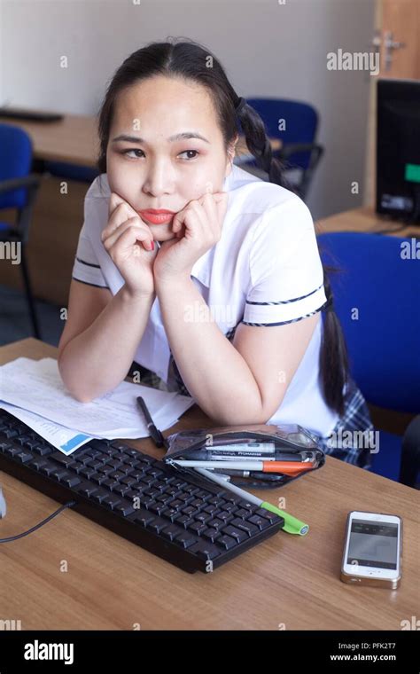 Bored School Girl In Classroom Stock Photo Alamy