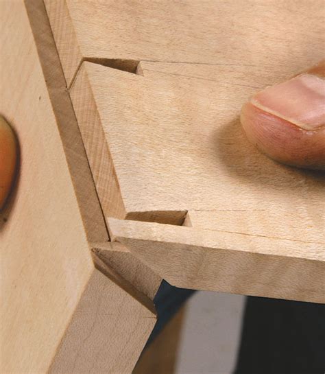 One of my favorite ways is to use a decorative spline. Miter Your Dovetails - FineWoodworking