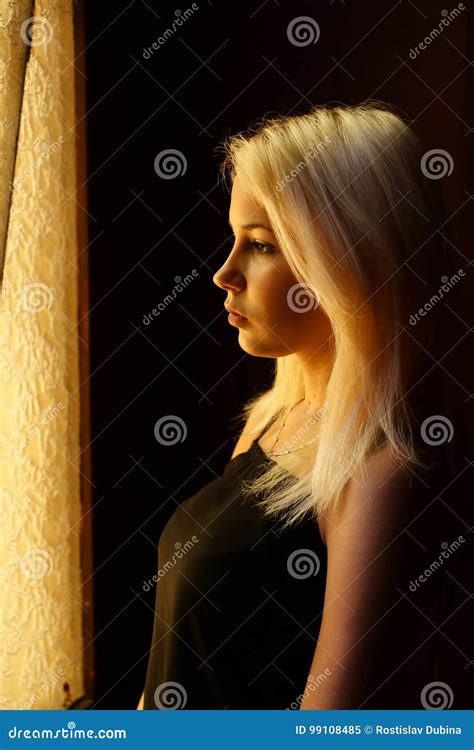 Beautiful Young Blonde Girl Dramatic Portrait Of A Woman In The Dark