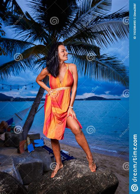 Woman Posing On The Beach Rocks At Sunset Stock Image Image Of Female Outdoor 193286495