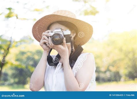asian woman photographer is taking photo stock image image of girl lifestyle 141306425