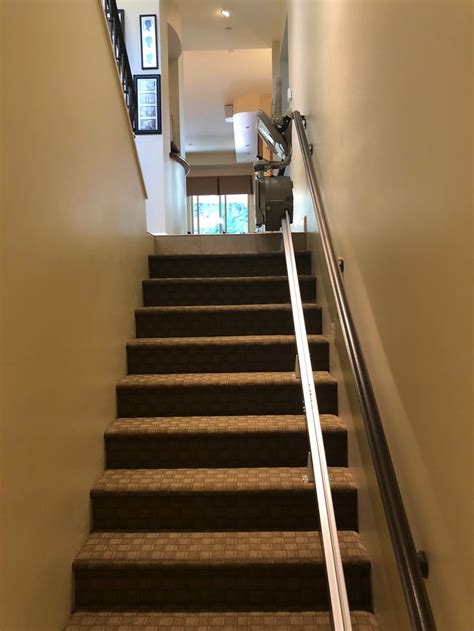 Stair lifts (also known as chair lifts) allow users to sit comfortably in a seat that takes them up the steps using the stairs' railing as a track. Pin on Stairlifts
