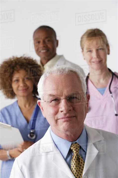 Portrait Of Four Medical Professionals Studio Shot Stock Photo