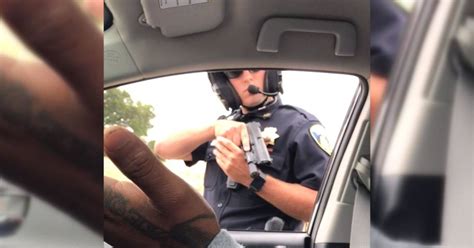 California Police Officer Points Gun At Passengers During Traffic Stop