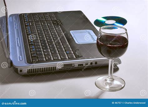 Laptop Computer With A Glass Of Wine And Cd Stock Image Image Of