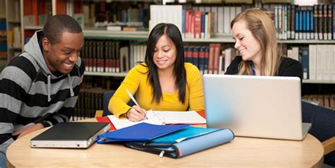 Who's who among students in american junior colleges. College students studying in a library of books - Library ...