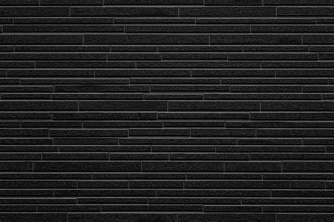 Modern Black Stone Tile Wall Pattern And Background Stock Photo