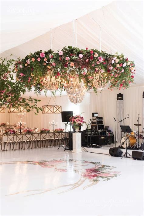 Bold Flower Chandeliers With Usual Crystal Ones For Accentuating A