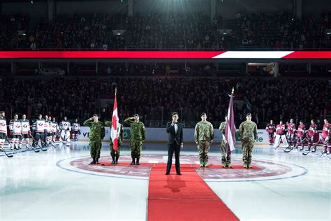 Canadian Troops In Latvia Present During The Canadian Anthem In A Pre