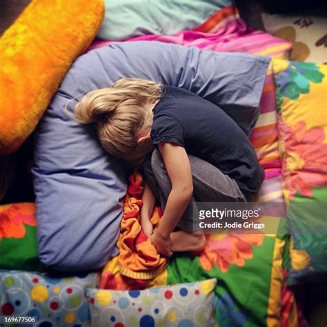 Girl Curled Up Photos And Premium High Res Pictures Getty Images