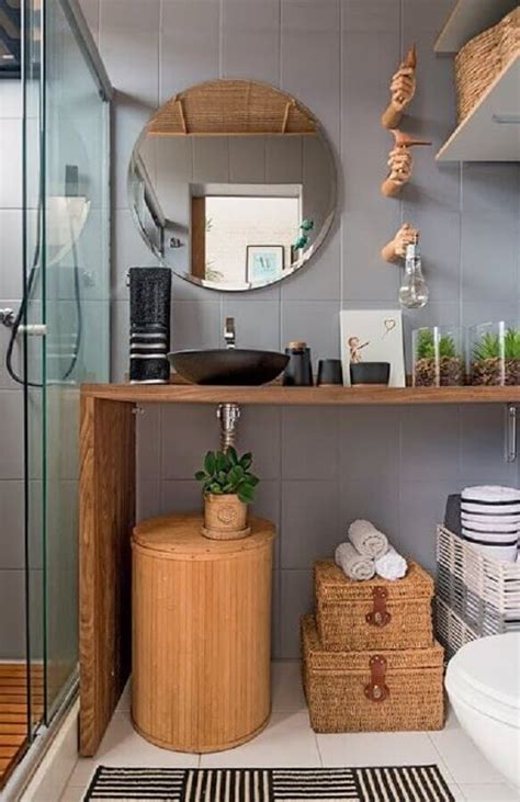 A Bathroom With A Sink Mirror And Shelves