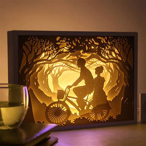 Papercut Light Boxes - The moment | 3d paper art, Lightbox art, Paper art