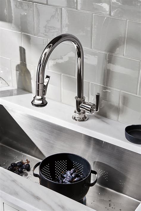 When the cross handle is rotated the flow of cold water begins; Henry One Hole Gooseneck Kitchen Faucet with Pull-Down ...