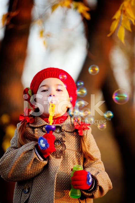 Little Girl Blowing Bubbles Stock Photo Royalty Free Freeimages