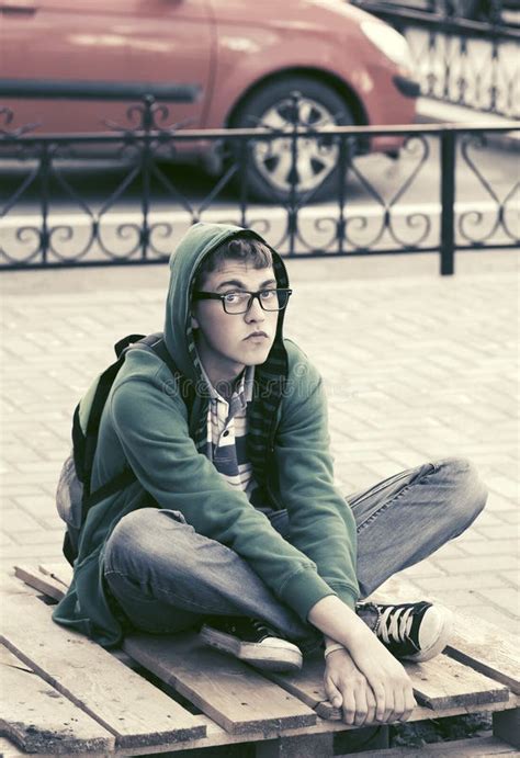 Sad Teen Boy In Depression Sitting On Sidewalk Stock Image Image Of