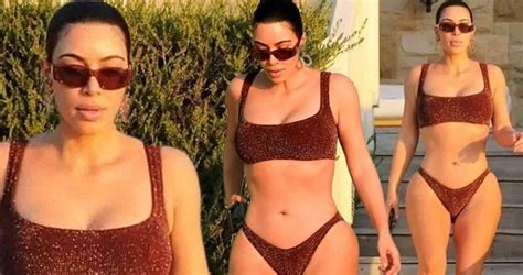 kim kardashian wears a bikini with 3 fiery rings