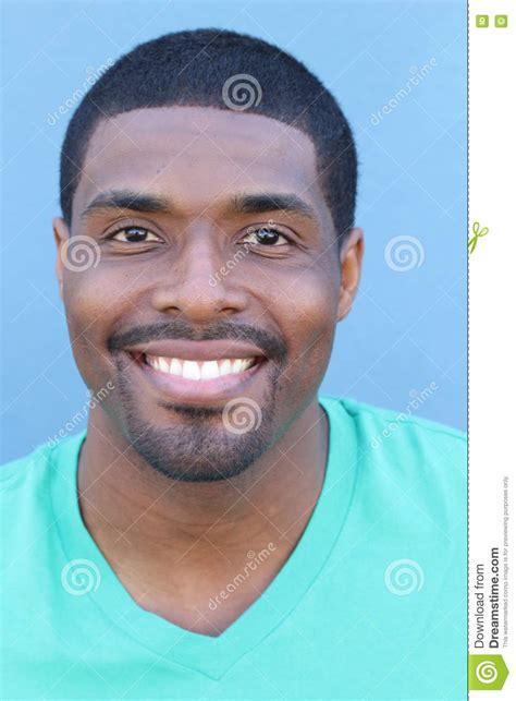 Close Up Portrait Of A Happy Black Man In His 20s With A Perfect Smile