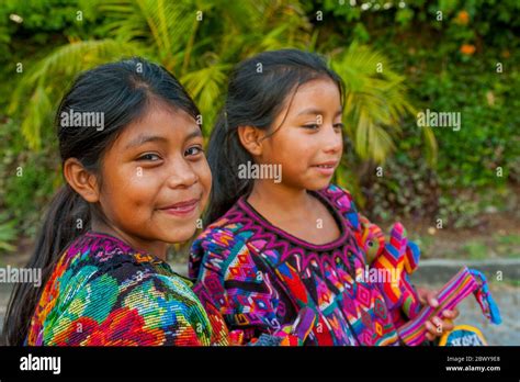 Two Mayan Girls In Traditional Clothing In The Town Of Panajachel On Lake Atitlan In The