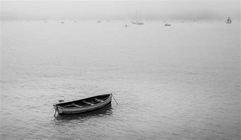 Rowboat On The Sea On A Foggy Morning Id 160873253
